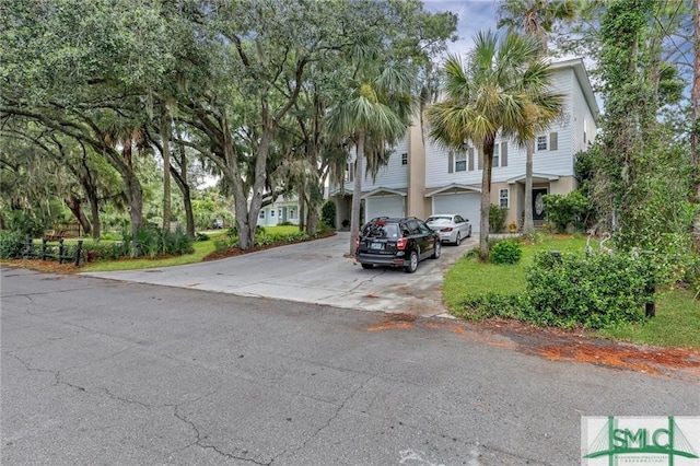 view of front of property with concrete driveway