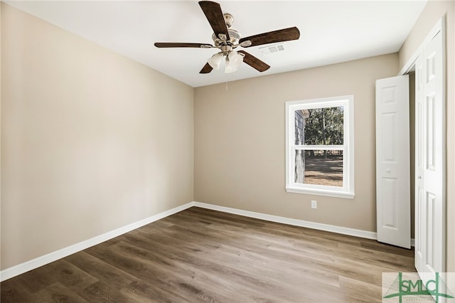 unfurnished bedroom with hardwood / wood-style flooring and ceiling fan