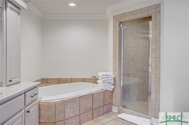 bathroom featuring vanity, ornamental molding, and plus walk in shower