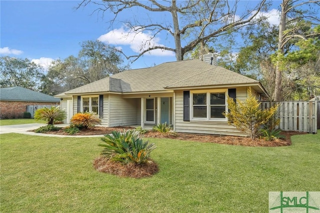 ranch-style house featuring a front lawn