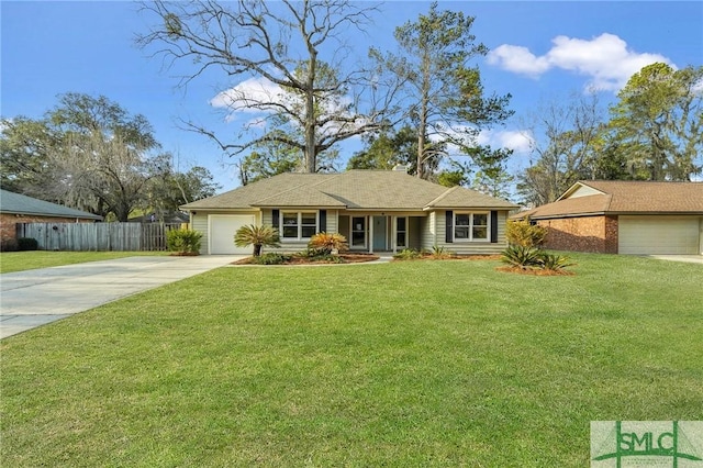 ranch-style house featuring a garage and a front lawn