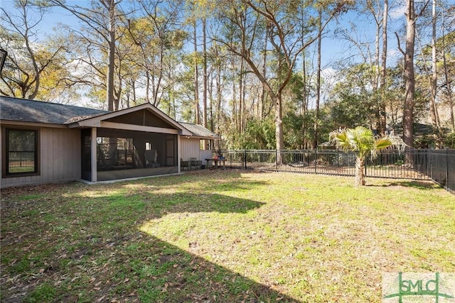 view of yard featuring a sunroom