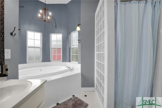 bathroom with vanity, tile patterned flooring, a chandelier, and separate shower and tub