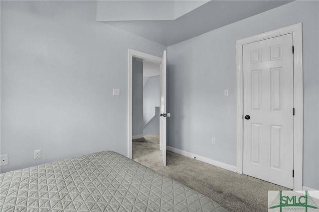 unfurnished bedroom with carpet flooring