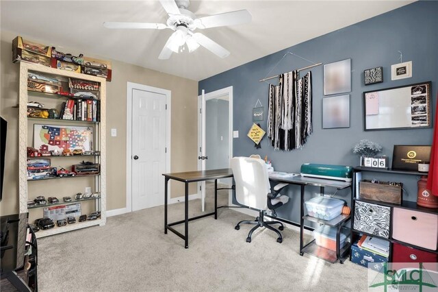 office area featuring carpet floors and ceiling fan