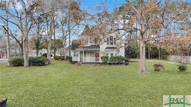 view of yard featuring a porch