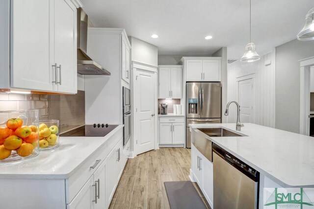 washroom with washer and clothes dryer and cabinets