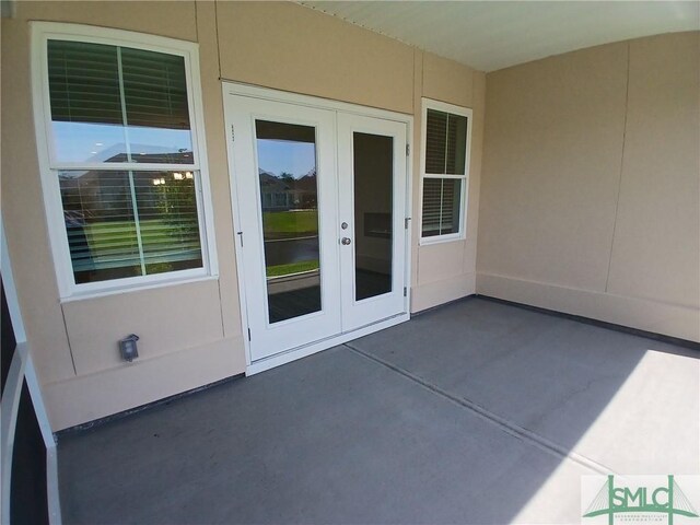 view of patio featuring french doors