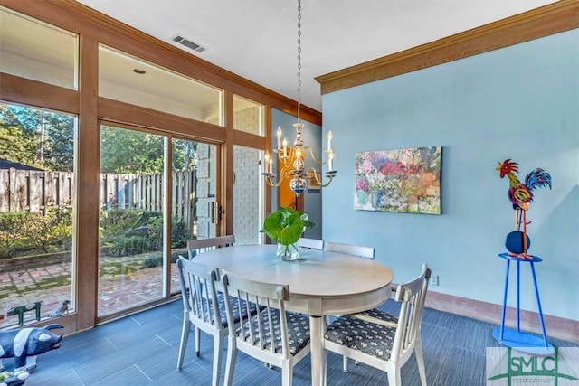 dining space featuring a chandelier