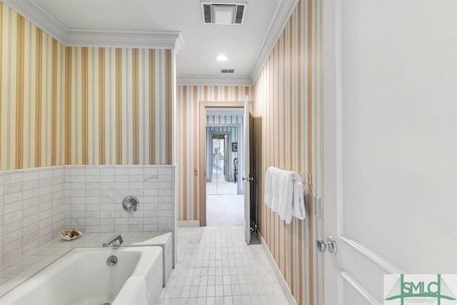 bathroom featuring crown molding, tile patterned floors, and a tub