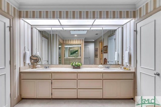 bathroom featuring vanity and crown molding