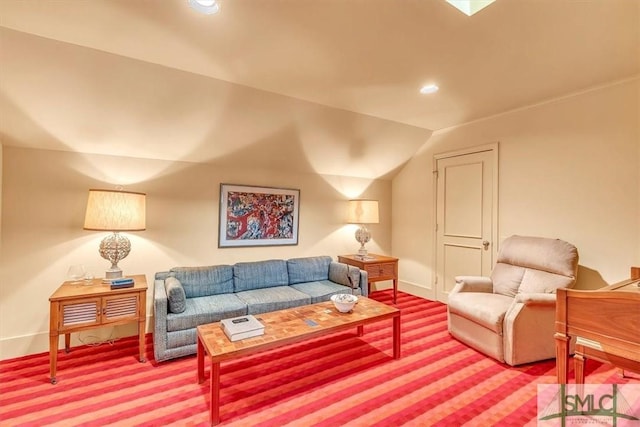 carpeted living room with lofted ceiling