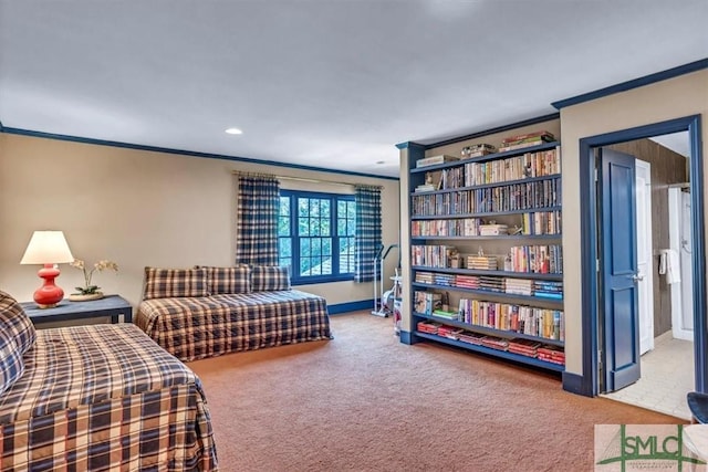 carpeted bedroom with ornamental molding