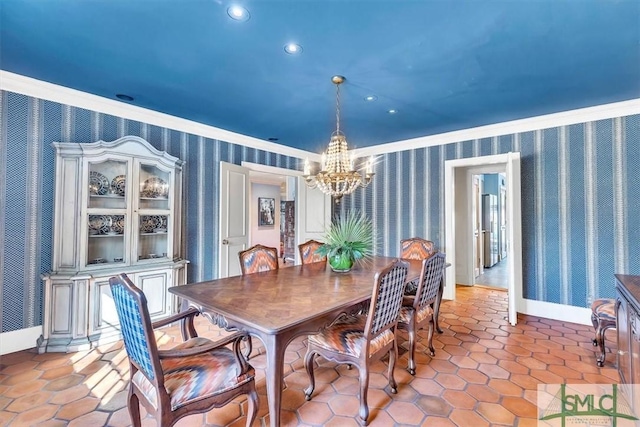 tiled dining space featuring a notable chandelier and crown molding