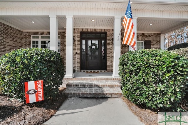 entrance to property with covered porch