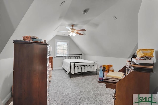 bedroom featuring lofted ceiling, ceiling fan, and carpet flooring