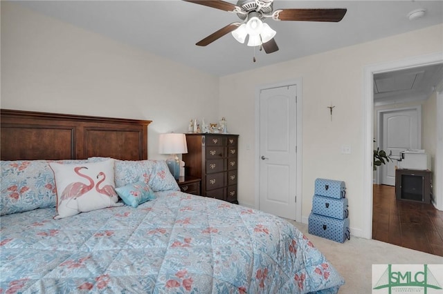 carpeted bedroom with ceiling fan