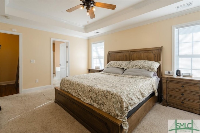 164 Glynn Ct, Hinesville, GA 31313 - bedroom featuring ensuite bathroom, a raised ceiling, light carpet, and multiple windows