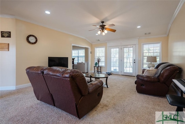164 Glynn Ct, Hinesville, GA 31313 - living room featuring light colored carpet, ornamental molding, and plenty of natural light