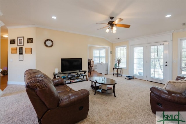 164 Glynn Ct, Hinesville, GA 31313 - carpeted living room featuring lofted ceiling, crown molding, and ceiling fan