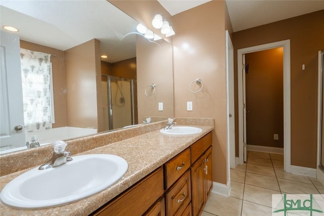 164 Glynn Ct, Hinesville, GA 31313 - bathroom with a shower with door, vanity, and tile patterned flooring