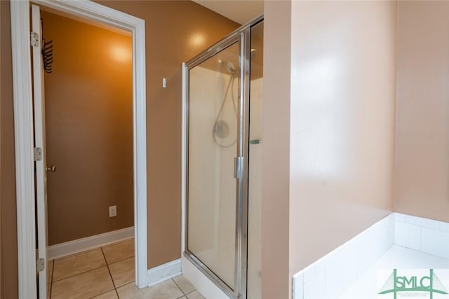 164 Glynn Ct, Hinesville, GA 31313 - bathroom featuring a shower with door and tile patterned floors
