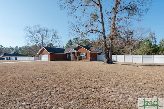 164 Glynn Ct, Hinesville, GA 31313 - view of front of house featuring a garage