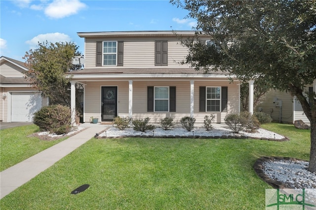 front of property featuring a garage, a porch, and a front lawn