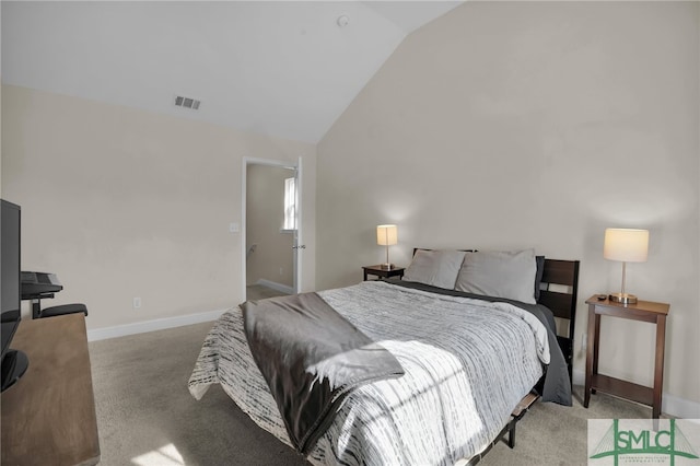 carpeted bedroom featuring high vaulted ceiling