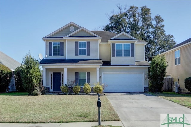 view of front of house featuring a garage and a front lawn