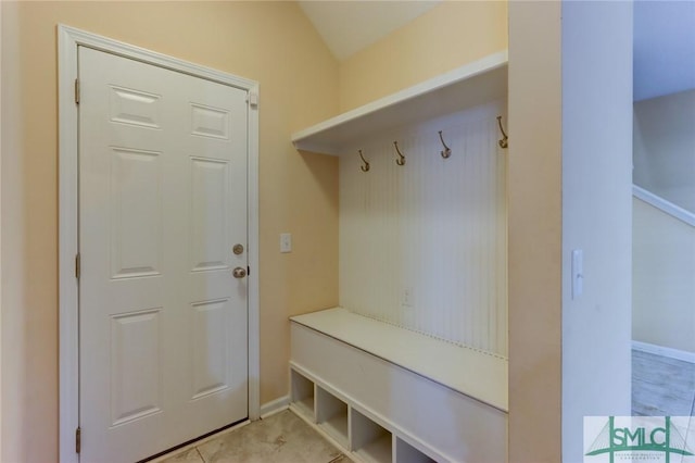 mudroom with light tile patterned flooring