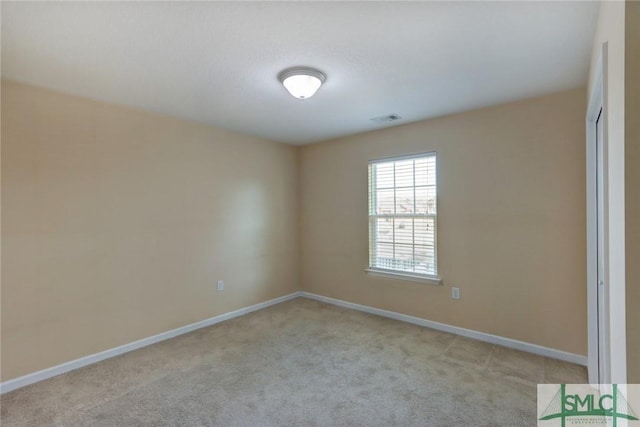 view of carpeted spare room