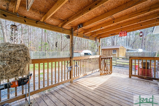 deck with a storage shed