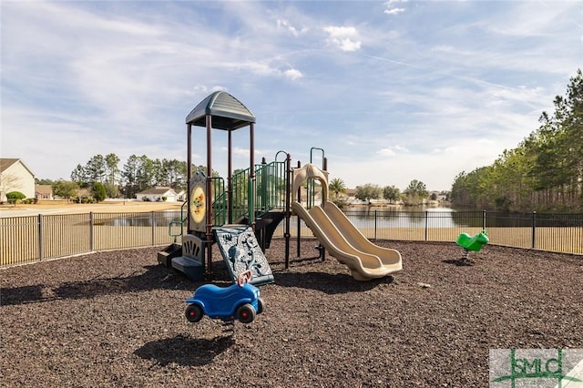 view of jungle gym featuring a water view