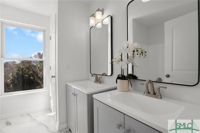 46 Captains Vw, Tybee Island, GA 31328 - bathroom featuring marble finish flooring and two vanities