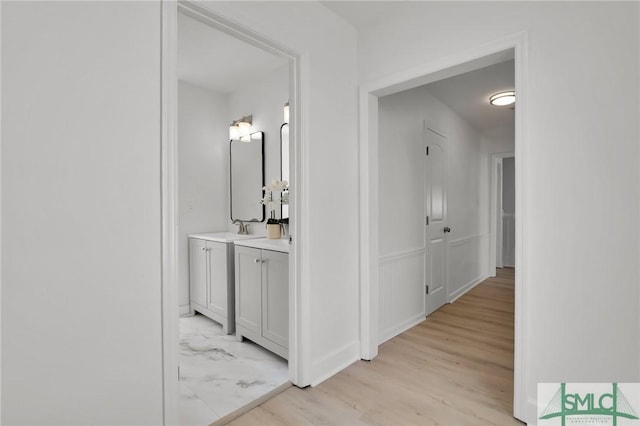 46 Captains Vw, Tybee Island, GA 31328 - hall with light wood finished floors and a sink