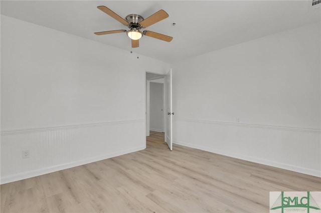 46 Captains Vw, Tybee Island, GA 31328 - unfurnished room with light wood-style floors and ceiling fan