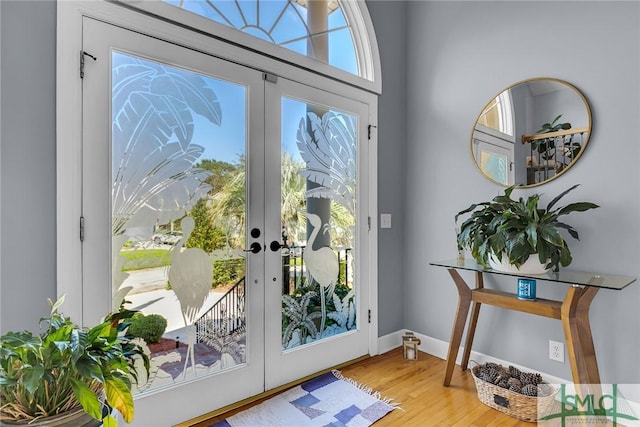 doorway featuring hardwood / wood-style floors and french doors