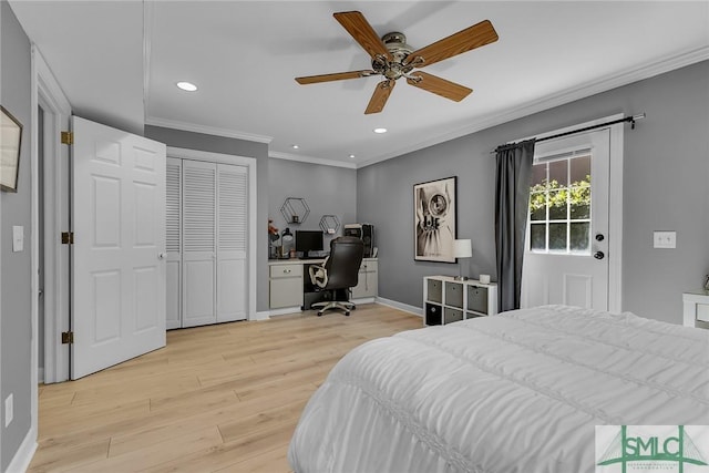 bedroom with ornamental molding, a closet, ceiling fan, and light wood-type flooring