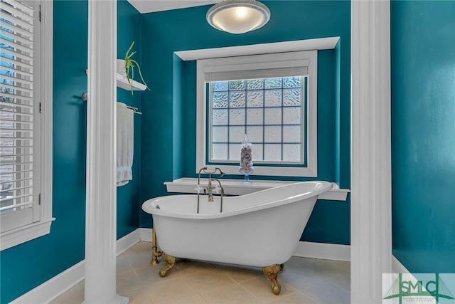 bathroom featuring tile patterned flooring and a bathtub