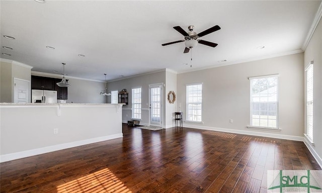 unfurnished living room with ornamental molding, dark hardwood / wood-style floors, and ceiling fan