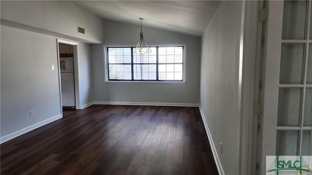 unfurnished dining area with lofted ceiling and dark wood-type flooring