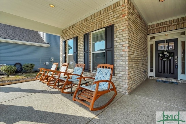 view of patio featuring a porch