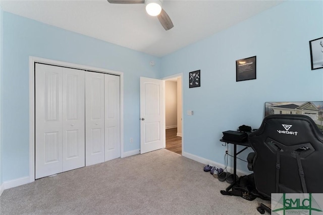 office area featuring ceiling fan and light colored carpet