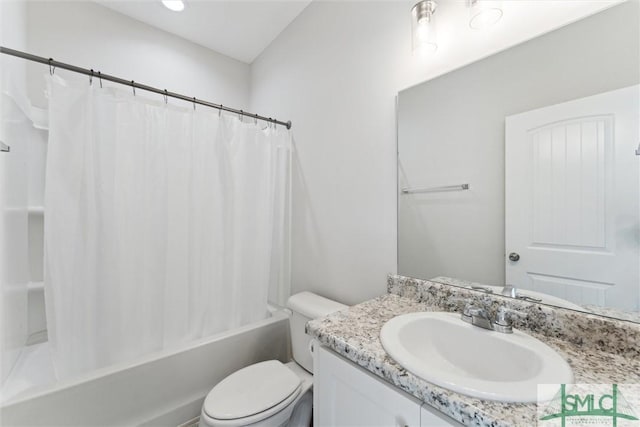 full bathroom with shower / tub combo with curtain, vanity, and toilet