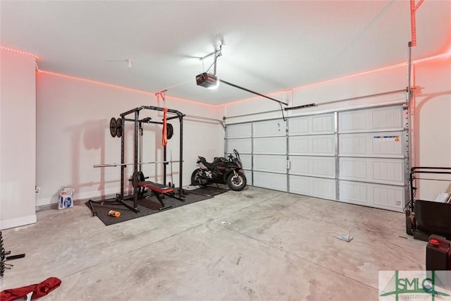 garage featuring a garage door opener