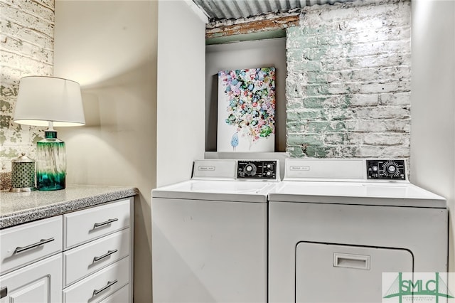 laundry room featuring laundry area and washing machine and clothes dryer