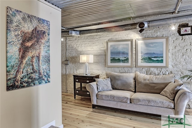 living area featuring hardwood / wood-style floors