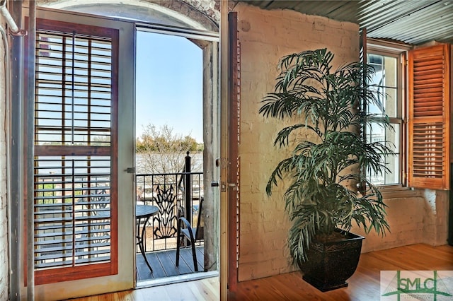 doorway to outside with light hardwood / wood-style flooring