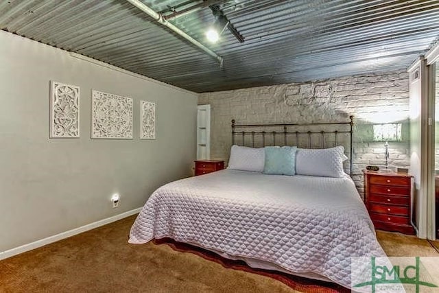 carpeted bedroom with baseboards